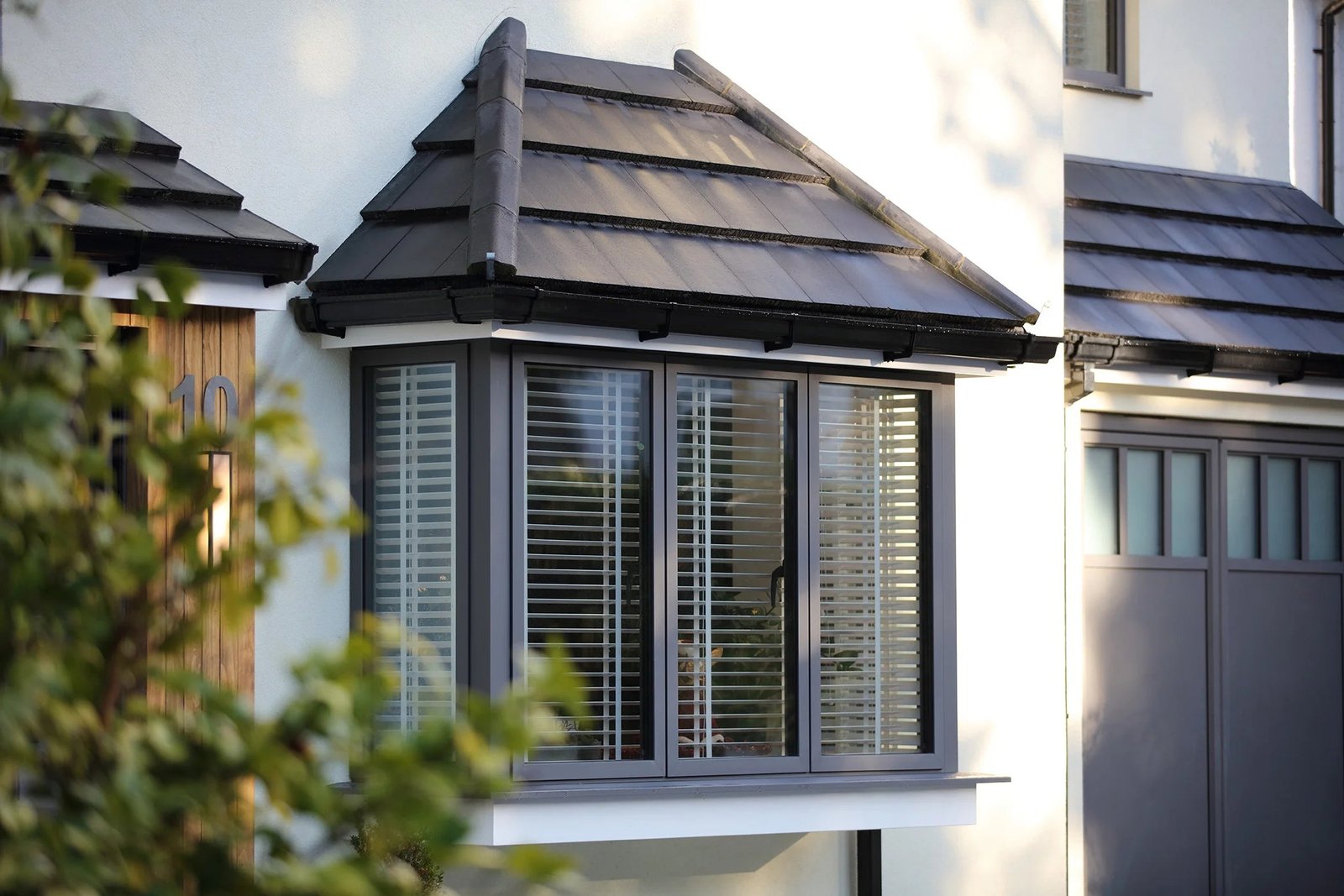 Bay window with grey aluminium frames